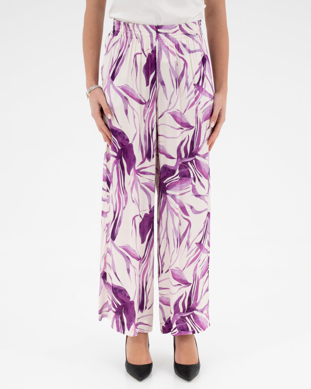 Purple floral patterned trousers