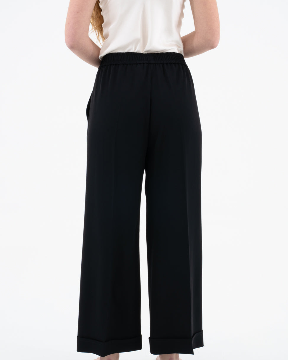 Trousers with elastic and cuff