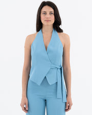 Fluid top with crossover neckline
