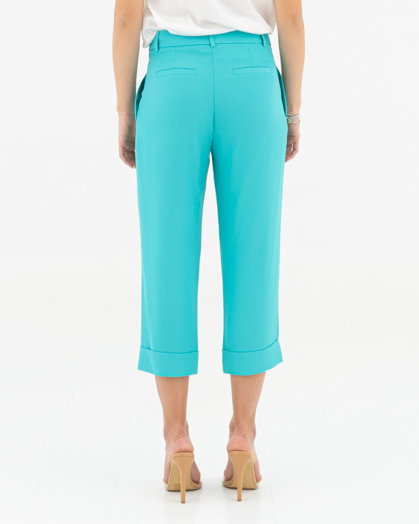 Trousers with cuff and pleats