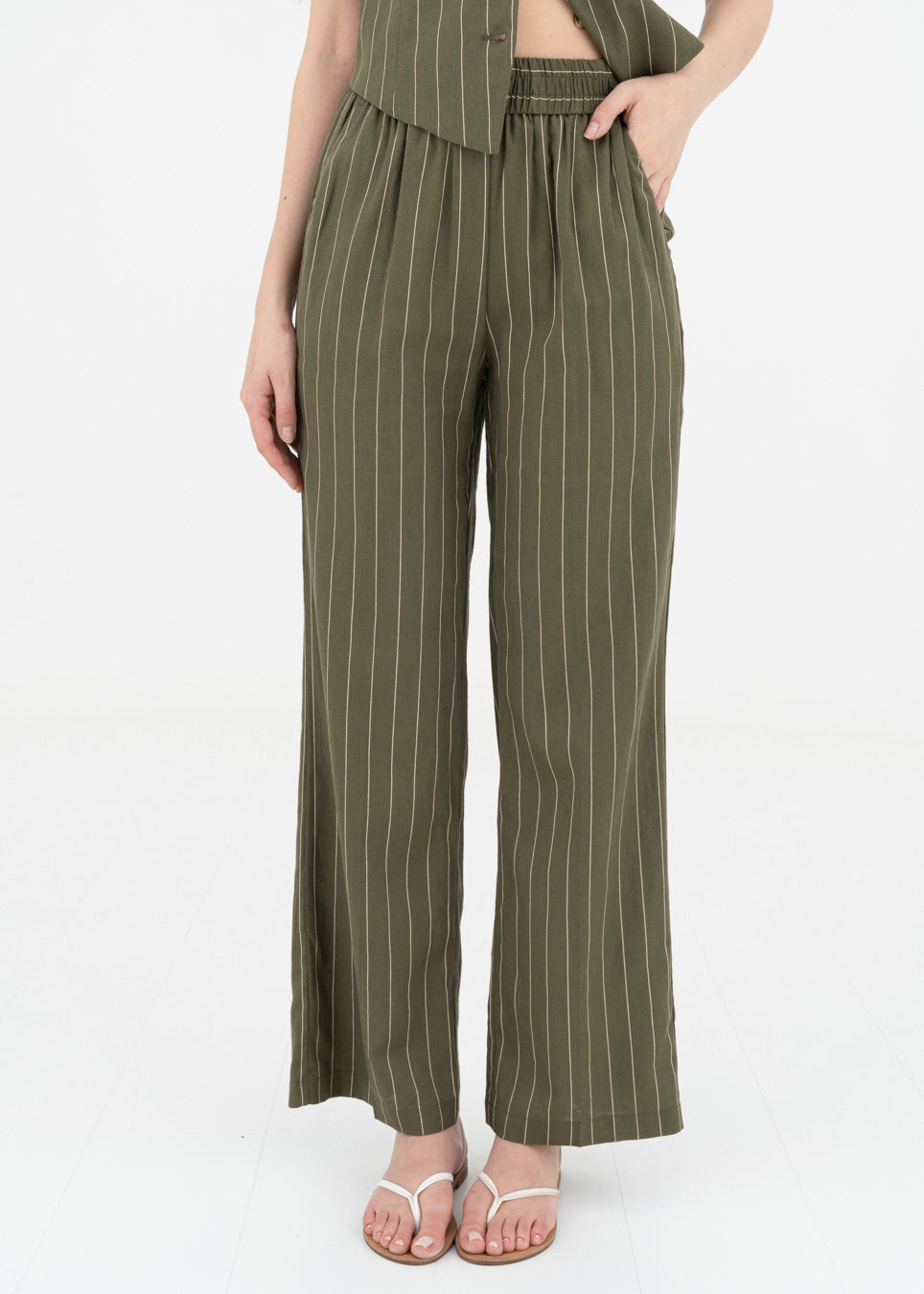 Pinstriped linen trousers with elastic