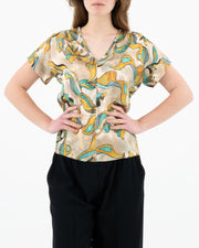 Blusa con scollo a V fantasia astratta