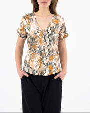 Blusa con scollo a V fantasia pitone